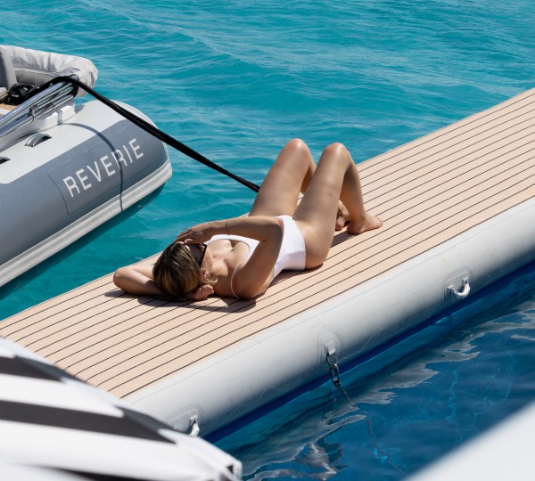 Sunbathing On A Yacht Charter
