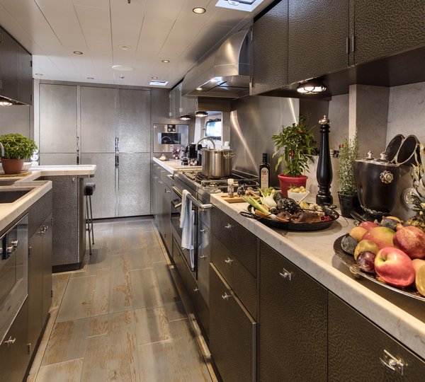 Food Preparation In The Galley Of Sailing Yacht PINK GIN VI