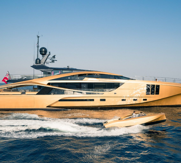 Gold Coloured Motor Yacht KHALILAH With Gold Tender