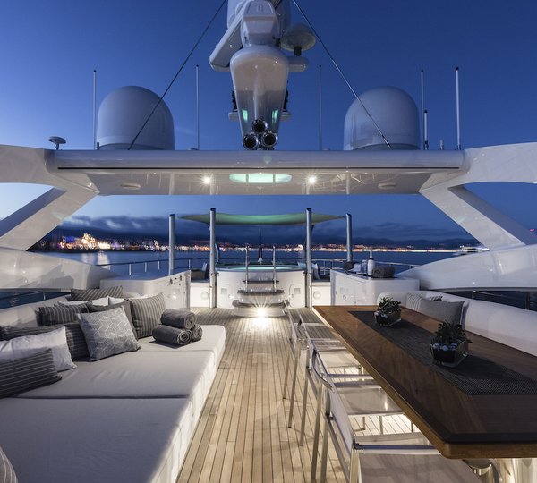 Sundeck Jacuzzi With Alfresco Dining And Lounging Area In The Evening