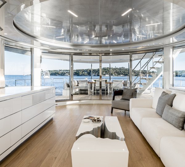 Main Saloon With The View Aft Onto The Exterior Deck Area