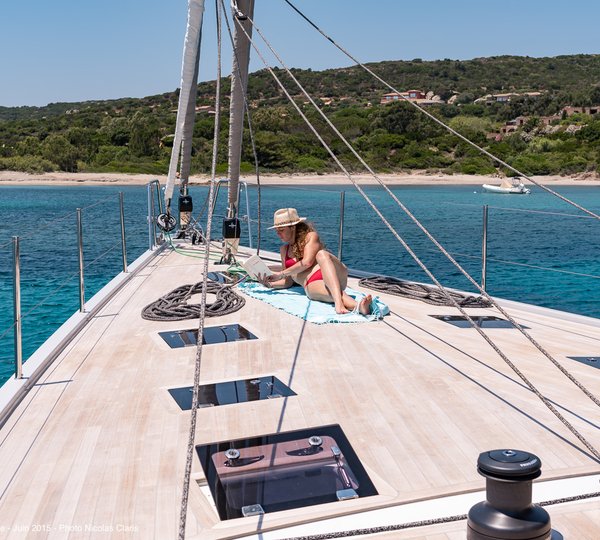 Relaxing With A Book On Yacht
