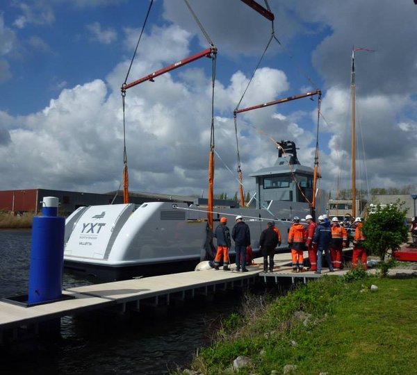 Support yacht YXT One on the water
