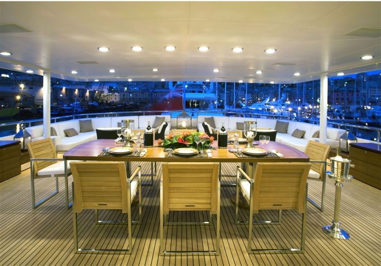 aft deck dining area in the evening