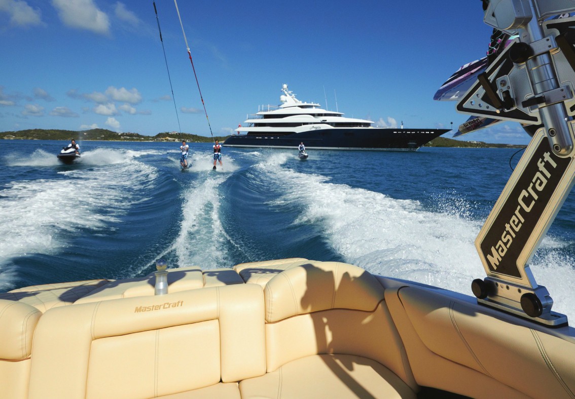78m custom superyacht with water toys viewed from tender