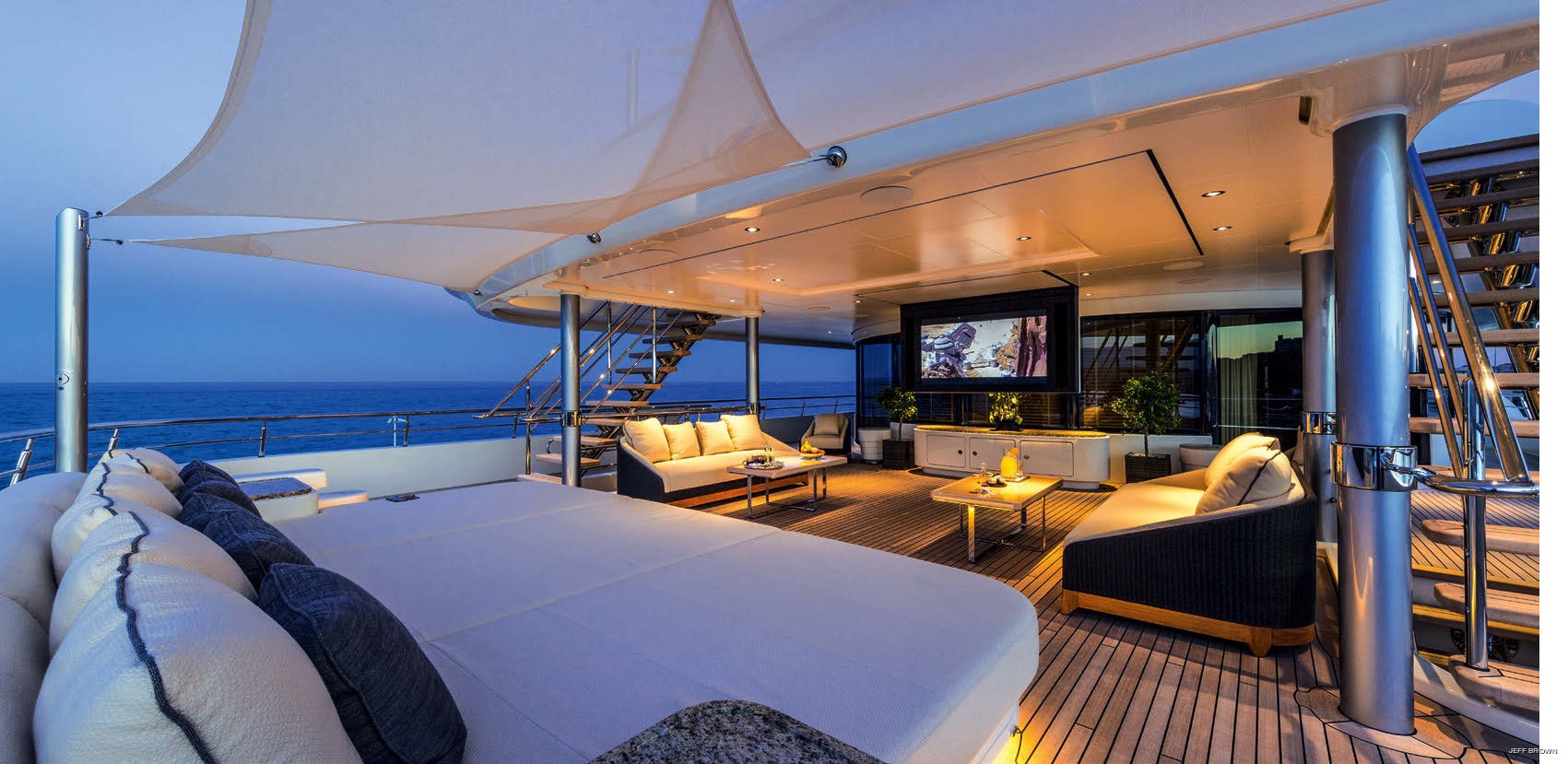 exterior lounging area with cinema under the stars