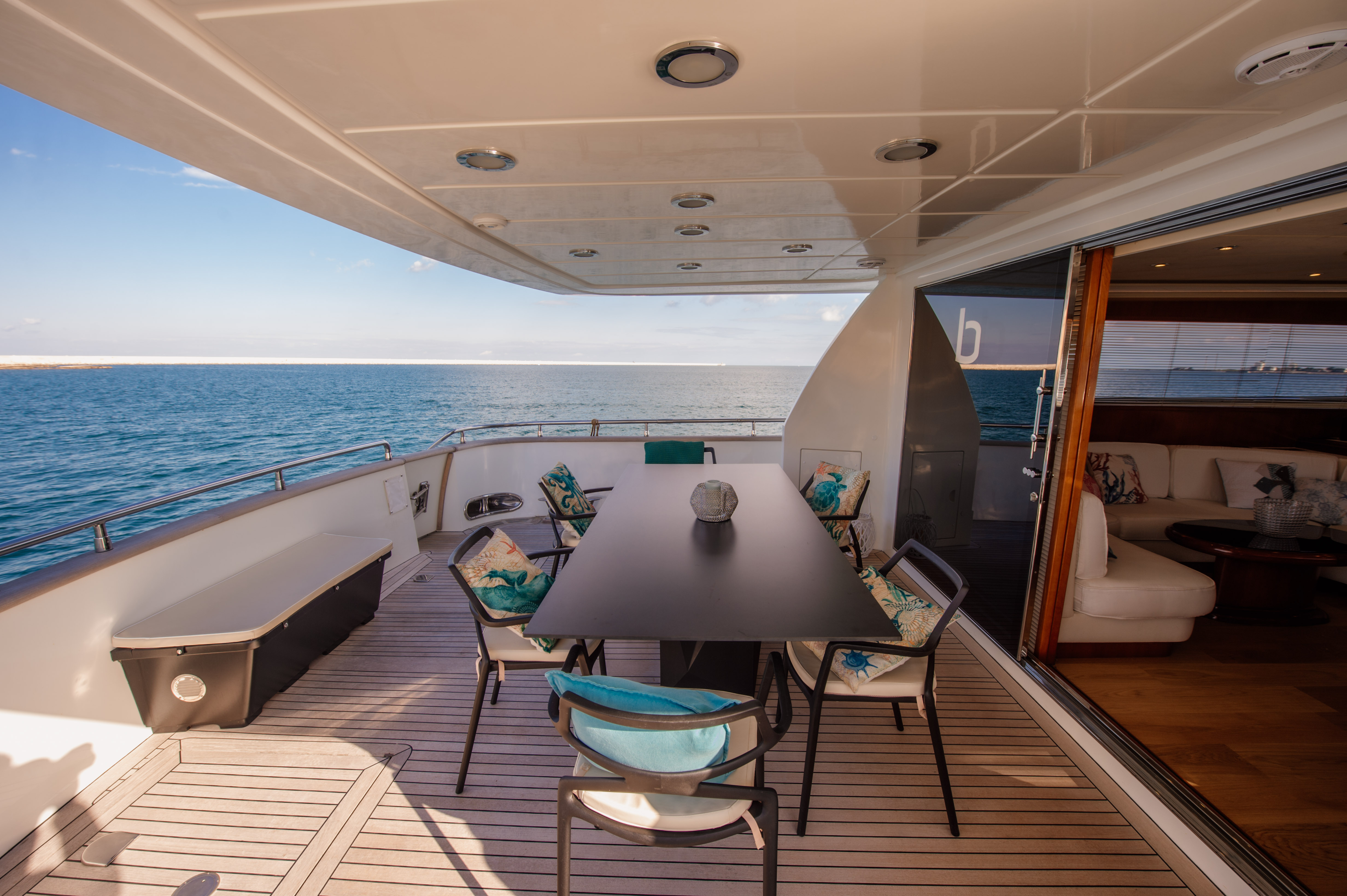 Shaded aft deck dining space