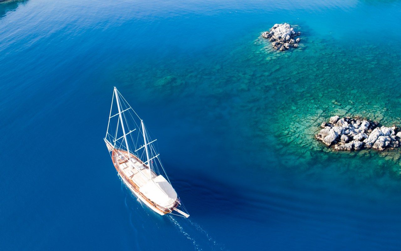 Aerial Of The Yacht In The Azure Waters Of Turkey
