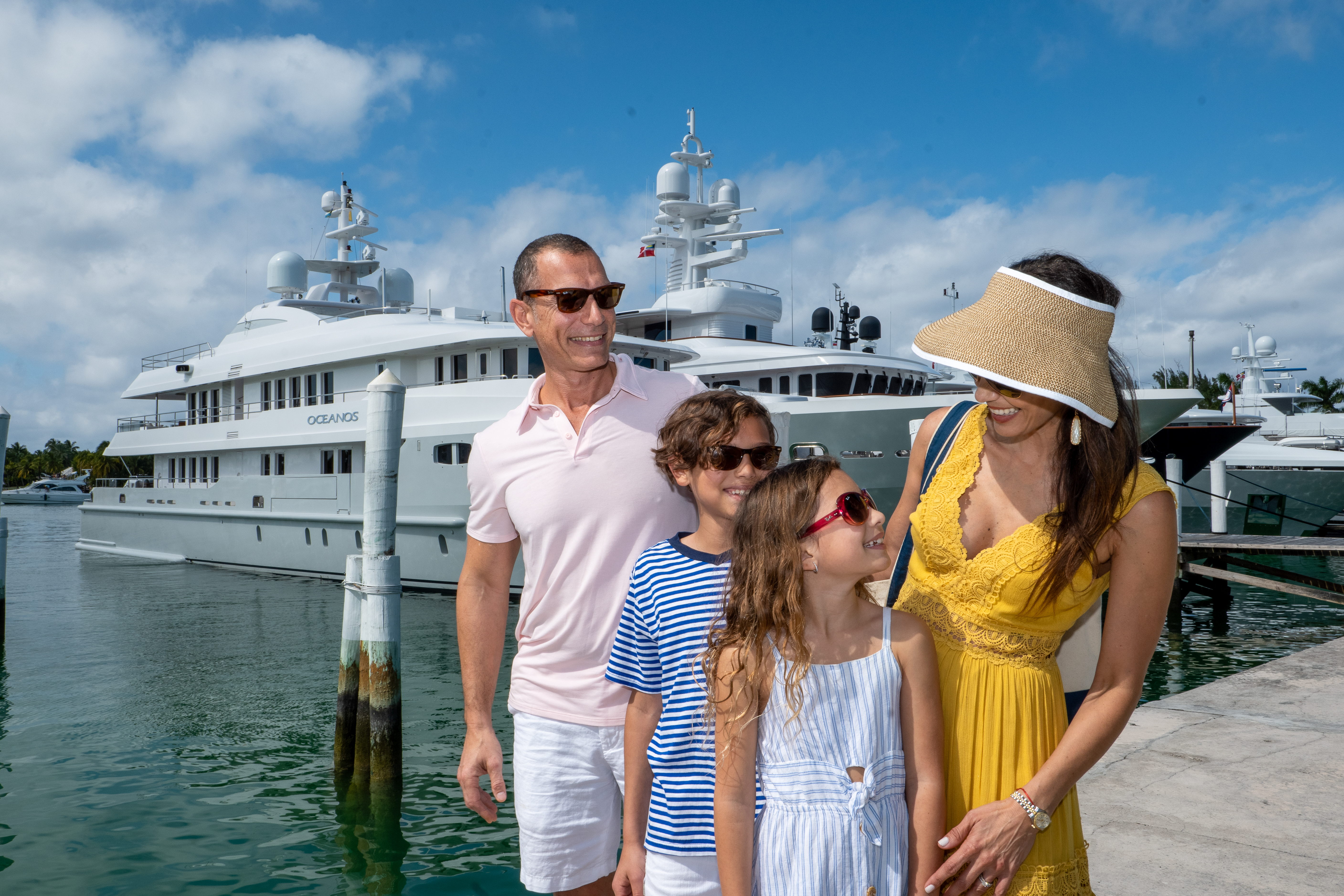 Family Near The Yacht Oceanos