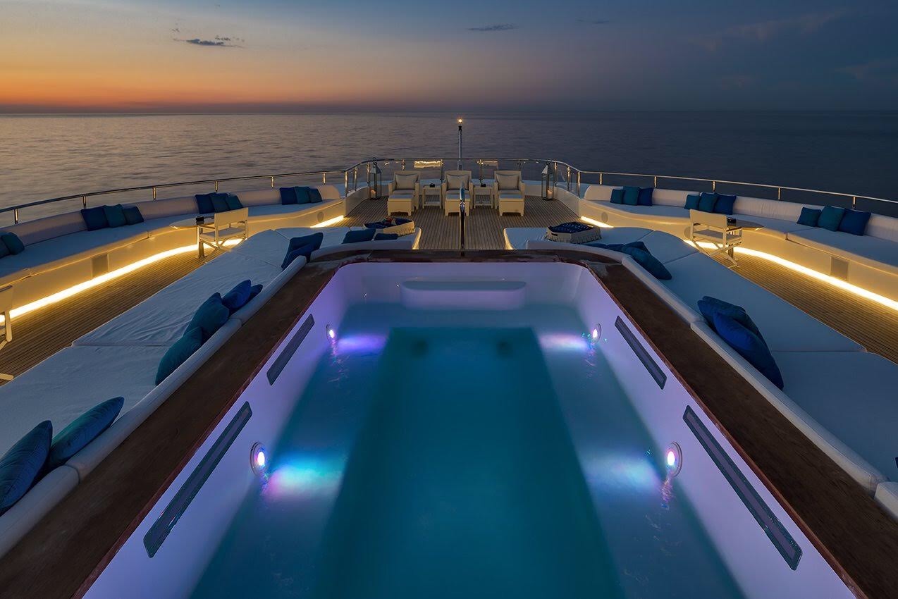 Swimming Pool And Sun Pads By Night