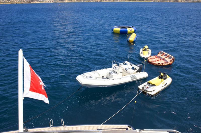 Ship's Tender With Toys On Yacht ADO
