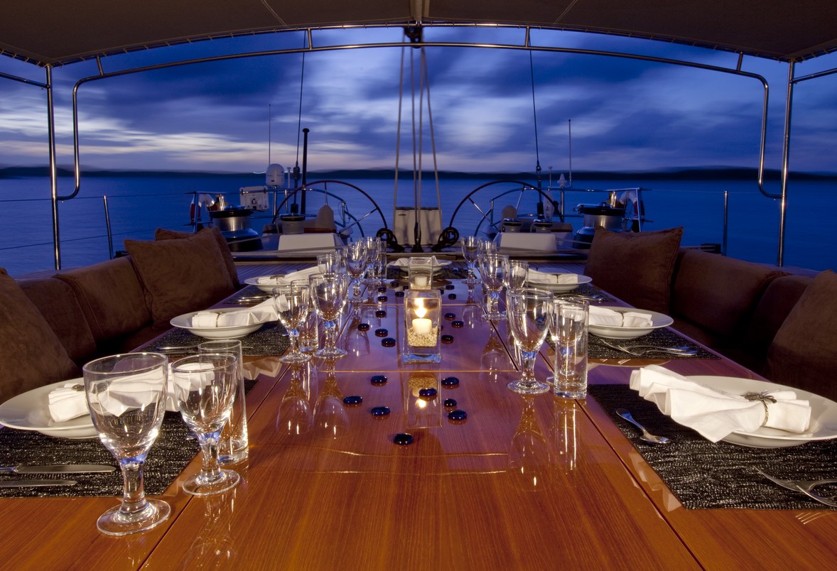 Sailing yacht oceans seven2 cockpit dining Eveing