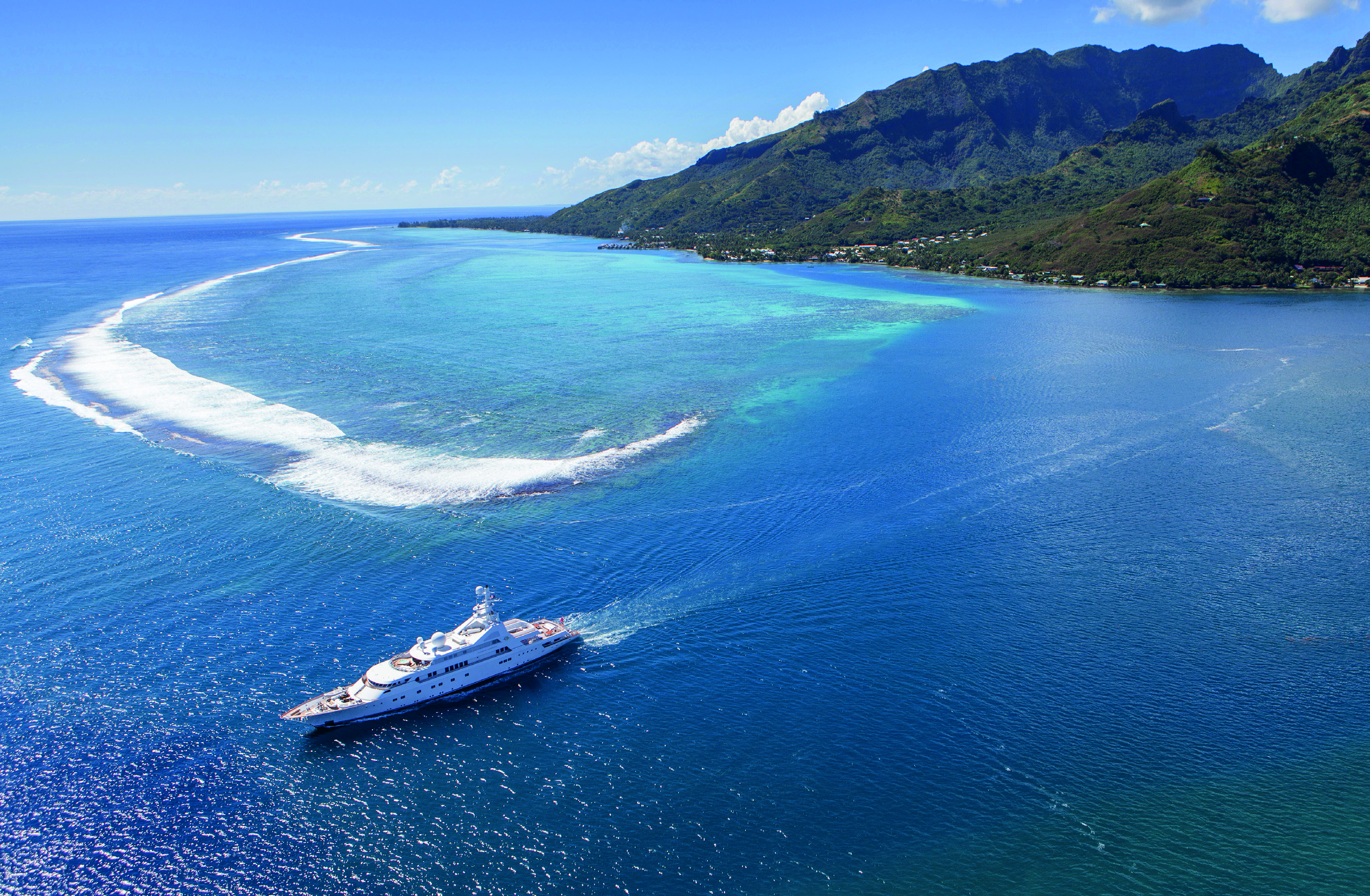 GRAND OCEAN  EX GOLDEN ODYSSEY II Running Aerial Shot in Tahiti, South Pacific