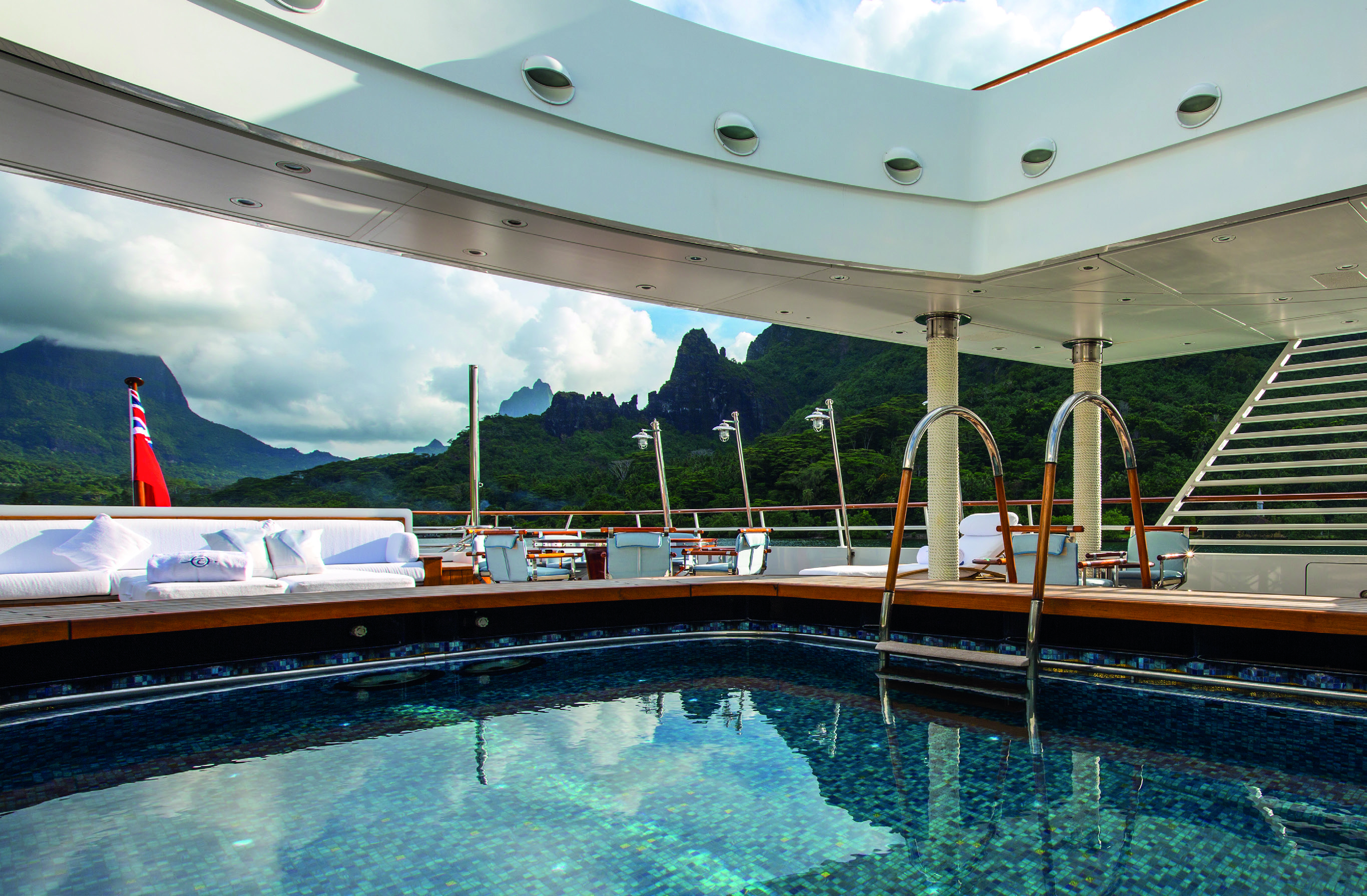 Enjoying Tahiti's beauty from the mosaic-tile swimming pool