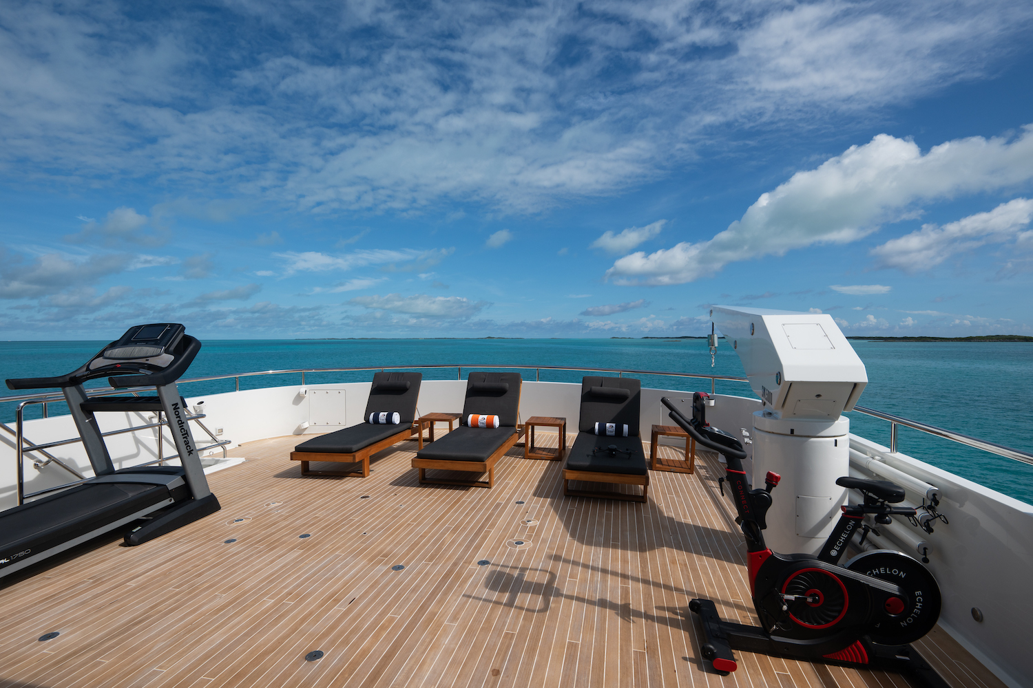Sun Deck Chaise Lounges And Gym Equipment