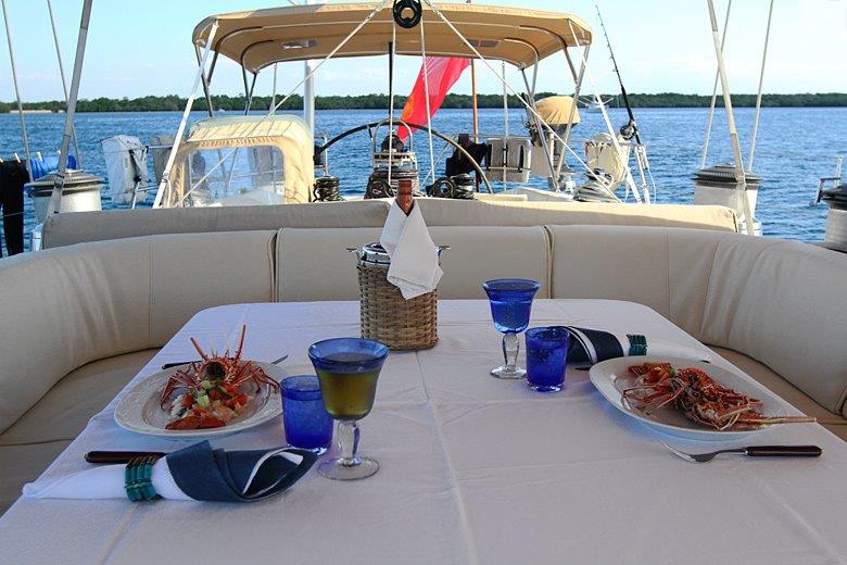 Al fresco dining aboard Aspiration yacht for charter