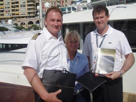 Winner Etihad Prize Draw Captain Olaf Steckstor with SYBA CEO MaryAnne Edwards & SYBA Chairman David McQueen