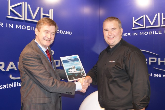 Left to right Svend Lykke Larsen, KVH Europe presents the award for 'Biggest Total Turnover in 2010' to Andrew Bush, C A Clase.