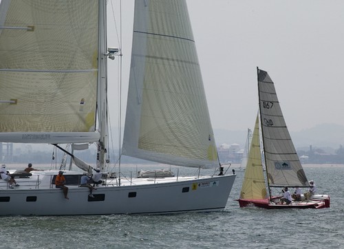Little and large - Intrigue (80’) and Pornstar (6.5m) were racing in the same division. Top of the Gulf Regatta 2009, Ocean Marina Yacht Club, Pattaya, Thailand Guy Nowell © Little and large - Intrigue (80’) and Pornstar (6.5m) were racing in the same division. Top of the Gulf Regatta 2009, Ocean Marina Yacht Club, Pattaya, Thailand Guy Nowell ©
