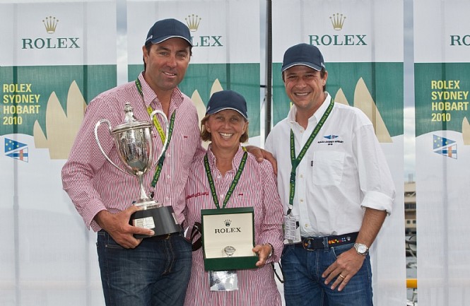Line Honours Prizegiving Ceremony From L-R Mark Richards, skipper of WILD OATS XI, Adrienne Cahalan, co-navigator of WILD OATS, and Patrick Boutellier, Rolex Australia Photo credit Rolex  Carlo Borlenghi
