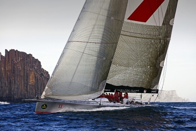 Provisional Line Honours Winner WILD OATS XI at the Organ Pipes, off Cape Raoul Photo credit Rolex  Daniel Forster