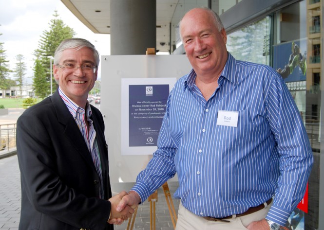 Riviera's Director of Brand and Communications Stephen Milne congratulates Riviera owner Rod Rebbeck who officially opened the new dealership