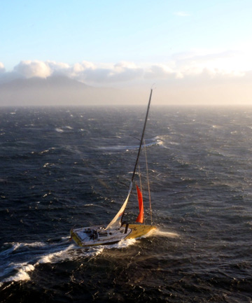 Le Pingouin, skippered by American Brad van Liew, crosses the finish line off Wellington to win the second leg of the Velux 5 Oceans round-the-world race.