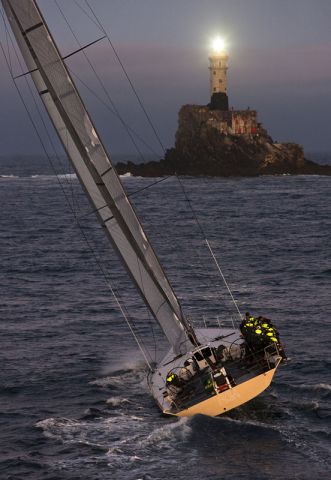 Overall winner, sailing yacht Rán, at the Fastnet Rock. Photo Rolex  Carlo Borlenghi