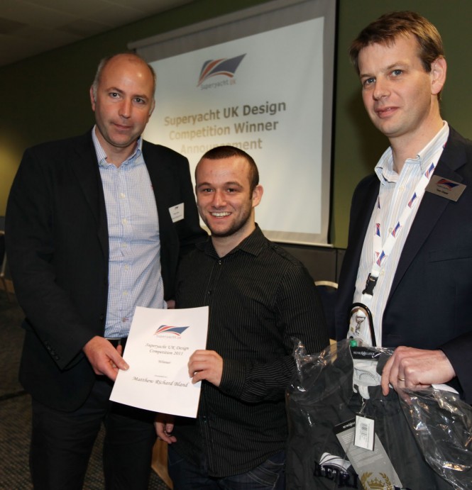 Toby Allies and Tom Chant presents Matthew Bland (centre) with with Superyacht UK Design Award at the Tullet Prebon International London Boat Show. Photo Credit onEdition