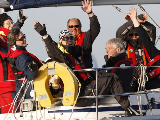 Happy smiling people racing aboard LAITA in 2010 - Credit Paul Wyeth