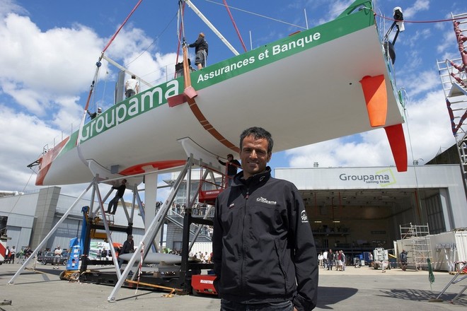 Franck Cammas and yacht Groupama 4 at her launch ( Photo by Yvan Zedda)