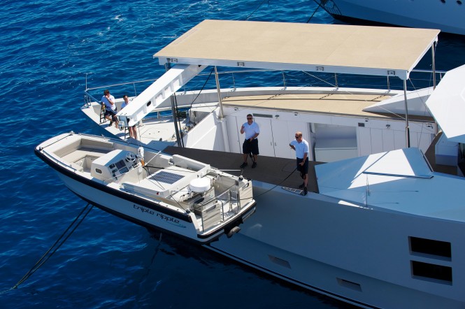 Tender Launching on the bow of motor yacht Big Fish
