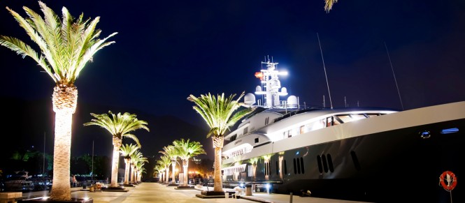 A superyacht berthed alongside Jetty 1 Marina Montenegro at night