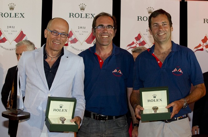 Igor Simcic, owner of ESIMIT EUROPA 2, Michel Heyraud and Dominique Heyraud owners of FOXY LADY, winners of the 2011 Giraglia Rolex Cup     Photo credit Rolex  Carlo Borlenghi