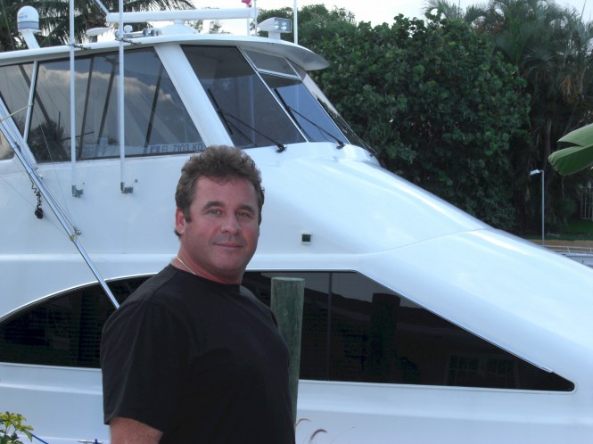 IAG Yachts recruit Dave Adams of Tricon Marine - Photo of Dave in front of Ocean 60' motor yacht