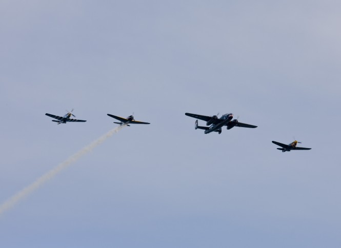 A collection of WWII aircraft performing crowd pleasing aerobatics following the 2011 Shipyard Cup -  Photo by Billy Black
