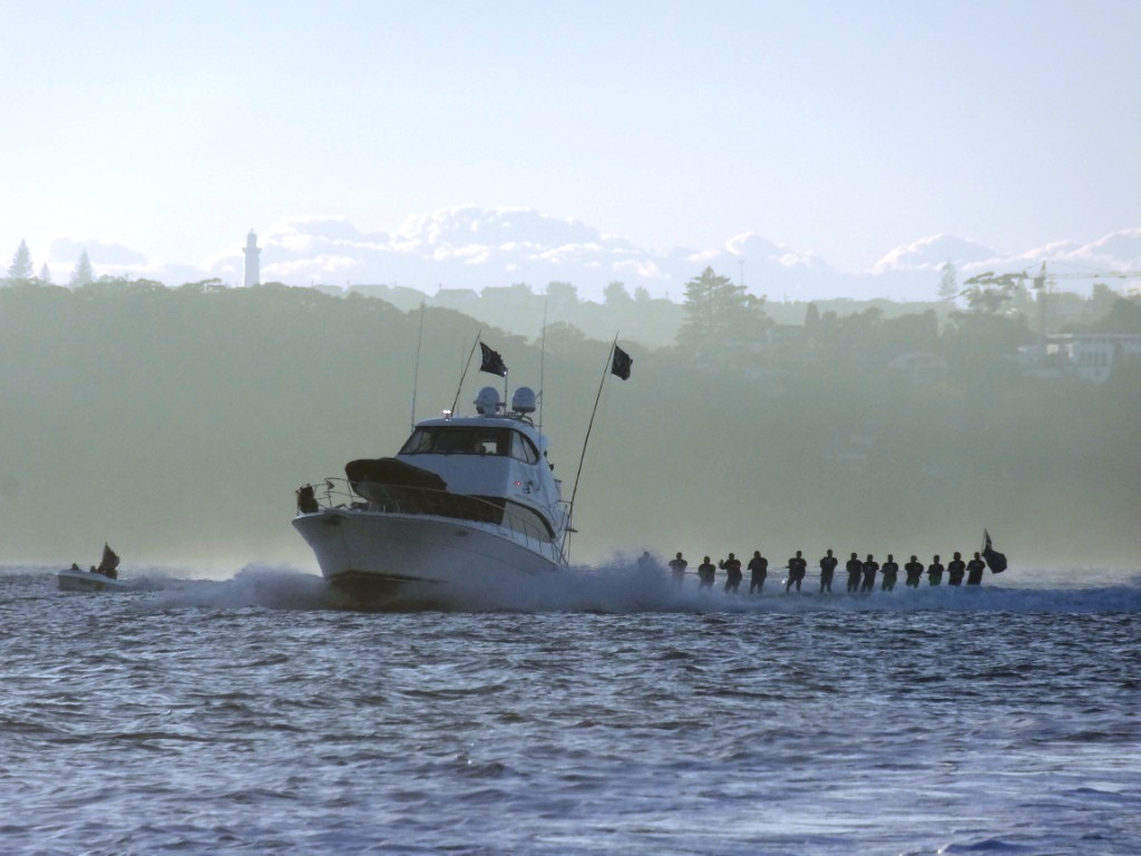 In a first for Sydney Harbour, Riviera's new 61 Series II Enclosed Flybridge towed 15 elite water-skiers from Rose Bay to the Sydney Opera House and back
