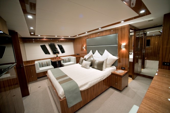 New Ocean Yachts 68 Enclosed Flybridge Motoryacht - Full beam master stateroom is an owners oasis