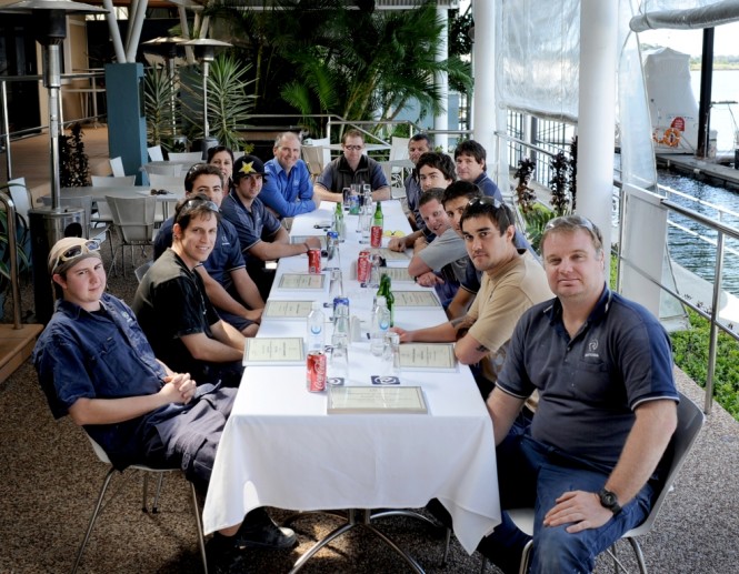 Riviera's chief operating officer Paul Lyons (left rear) congratulates the nine graduating apprentices