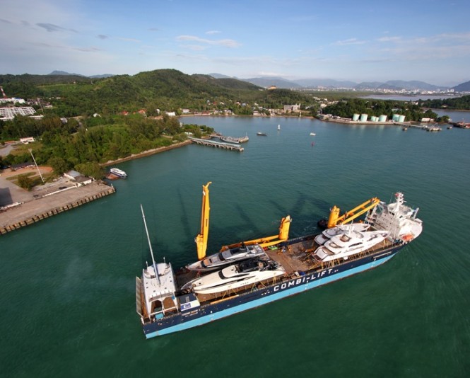 Combi Dock 1, owned by Combi Lift, arriving in Phuket, Thailand with 7 superyachts onboard