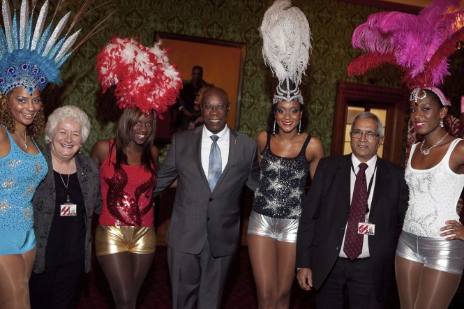 Baroness Harris of Richmond, His Excellency Hugh Arthur, Barbados High Commissioner to the UK, and Lord Dholakia with the Barbados Tourism Authority’s Carnival Girls. Credit The Barbados Tourism Authority