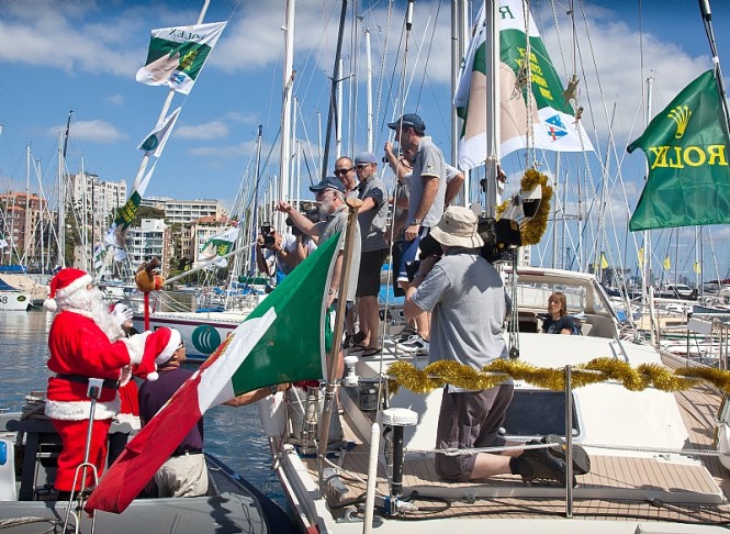Santa visiting ONELIFE crew, Alberto Biffignandi, ITALY Photo By Rolex  Daniel Forster