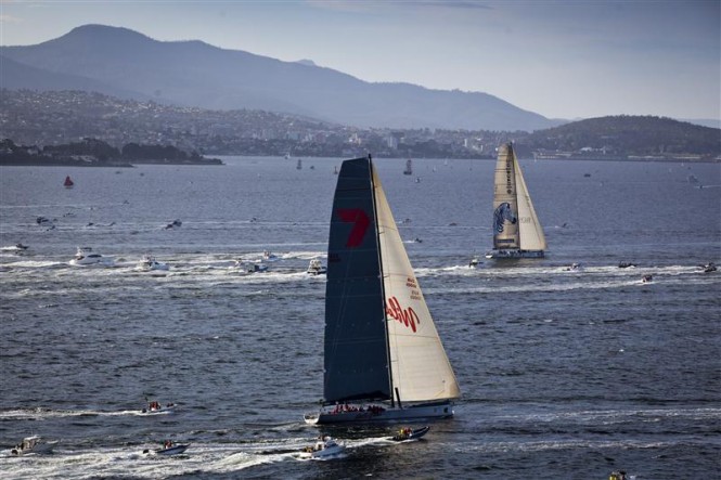 Super maxi sailing yachts INVESTEC LOYAL and WILD OATS XI close to the finish line on the Derwent River Photo: ROLEX/D. Forster