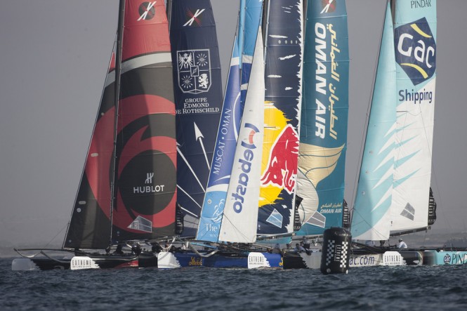 Extreme 40 yachts racing on the first day of racing in Muscat Credit: Lloyd Images