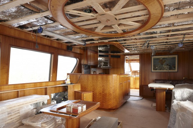 Main lounge of the motor yacht SJS getting new ceiling, TV + lift and settees