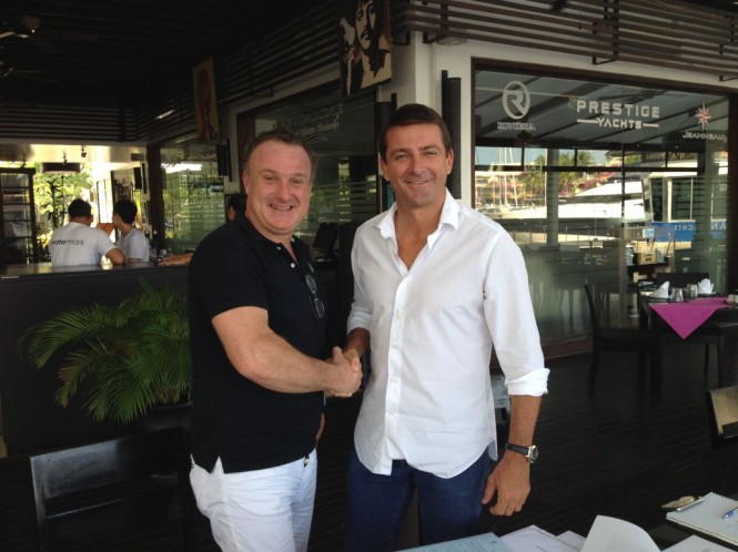 Cantiere delle Marche’s Sales and Marketing Director Vasco Buonpensiere, left, and Lee Marine’s Managing Director Josh Lee shake hands in Phuket on the new relationship.