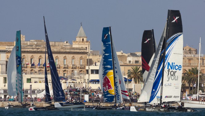 Fleet racing on the final day in front of the packed Race Village in Trapani Credit Lloyd Images