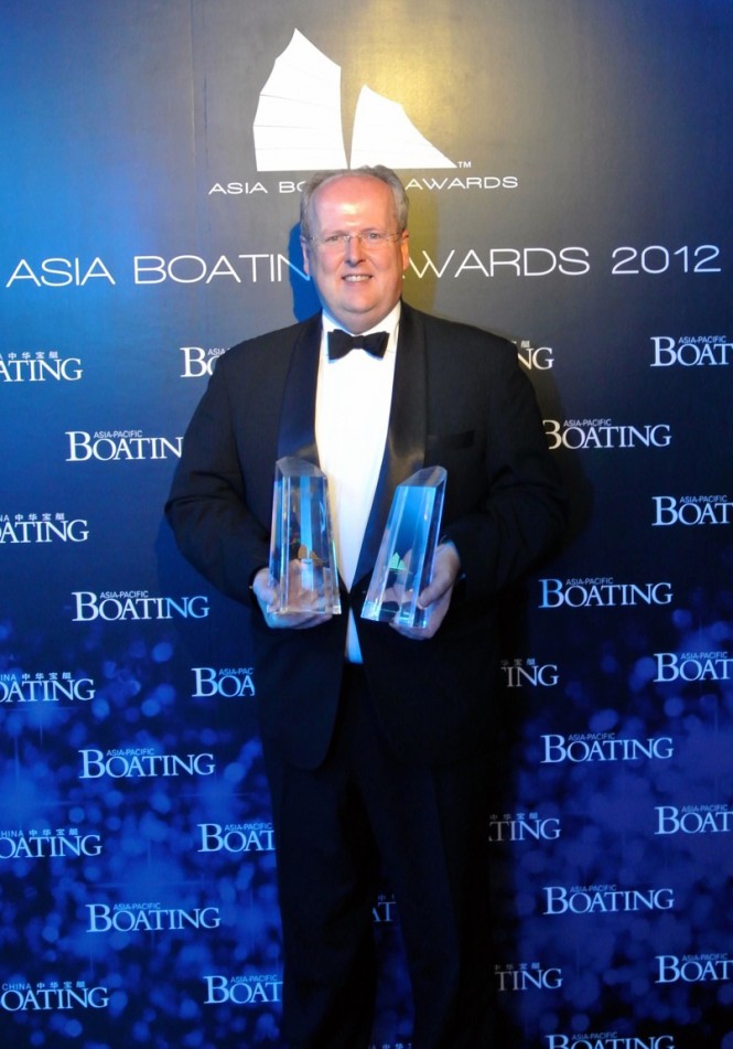 Royal Hong Kong Yacht Club General Manager, Mark Bovaird collects both awards