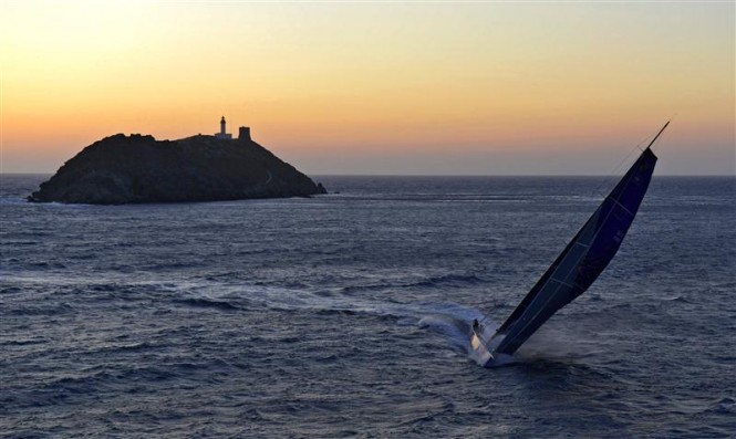 100ft superyacht Esimit Europa 2 passes the Giraglia rock at sunset Credit RolexKurt Arrigo