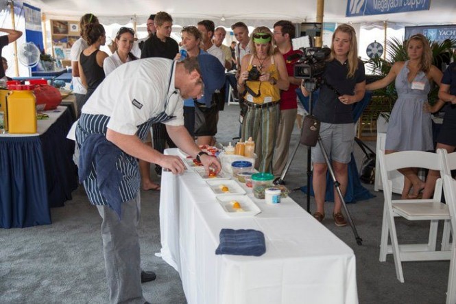 Competitor in the Grande Class prepares his dish for judges. Photo Credit: Billy Black